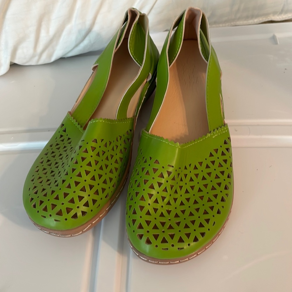 Green slip on shoes. Size 8 W.